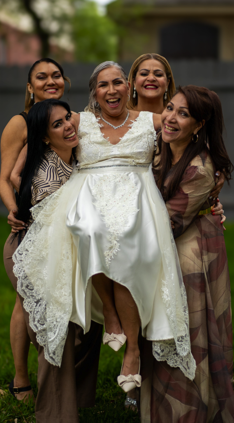 Bride laughing with her closest friends after the ceremony